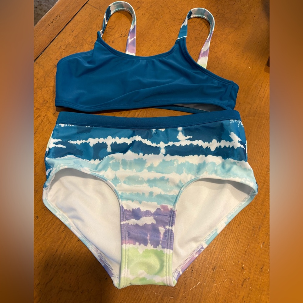 Girls bathing suit bikini never worn size large (10/12)